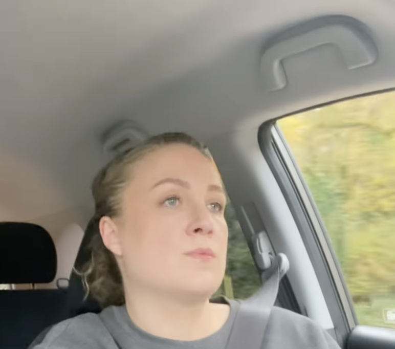 Close up of Nicole driving looking straight ahead